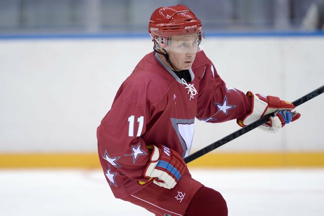 Putin playing hockey in 2014